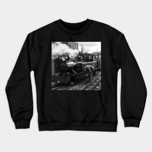 Engineer attending to a steam train on the Bure Valley Railway Crewneck Sweatshirt